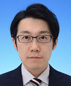 郷 賢治